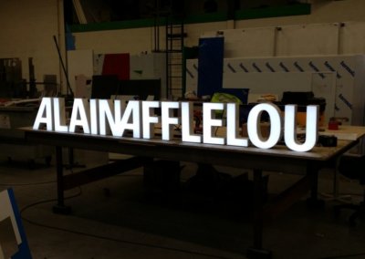 Vos enseignes à Lyon: Enseigne lumineuse avec lettres en relief pour Alain Afflelou par SES Grigny-Lyon